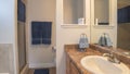 Pano Bathroom interior with built-in marble sink, tub, toilet bowl and shower stall Royalty Free Stock Photo