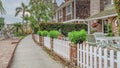 Pano Beautiful homes along pathway and canal in picturesque Long Beach California