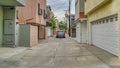 Pano Car on a narrow neighborhood street along houses in Long Beach California