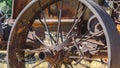 Pano Close up of the rusty wheels of an old vintage tractor on a farm on a sunny day Royalty Free Stock Photo