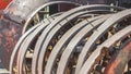 Pano Damaged and rusty wheels of an old vintage tractor on a farm on a sunny day Royalty Free Stock Photo