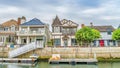 Pano Elegant houses overlooking public canal with walkways in Long Beach California