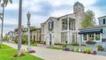 Pano Elegant two storey houses and tall palm trees in scenic Long Beach California