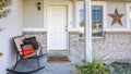 Pano Front exterior of a house with bricks and ornament