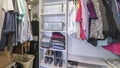 Pano Full small walk in closet with baskets and vault inside