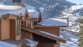 Pano House with snow and icicles against Park City Utah mountain on a winter setting