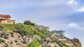 Pano Houses with ocean front views against cloudy sky background in San Diego CA Royalty Free Stock Photo