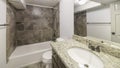 Pano Interior of a small bathroom with white walls and tiles Royalty Free Stock Photo