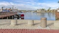 Pano Scenic sea with boat docks under vibrant blue sky in Huntington Beach California Royalty Free Stock Photo