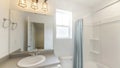 Pano Small and simple bathroom interior with vanity and window Royalty Free Stock Photo