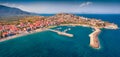 Panonoramic view from flying drone of Astros port. Sunny summer seascape of Myrtoan Sea.