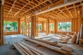 A panorama aerial view of a building under construction surrounded by wood framing beams and frameworks Royalty Free Stock Photo