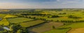 Panorama aerial view of countryside infrastructure windmills and agriculture field. Agriculture fields and different variety of ha