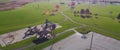 Panorama aerial view empty parking space at community recreational center with playground, huge grassy baseball field and colorful Royalty Free Stock Photo