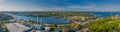 Panorama aerial view of the Kiel Canal waterway with lockage Holtenau. Cargo ships pass the Holtenau lock of the Kiel Canal. Indus