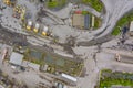 Panorama aerial view quarrying extractive industry big mining of machinery trucks open pit mine mining, dumpers Royalty Free Stock Photo