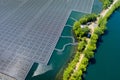 Aerial view of renewable alternative electricity energy the floating solar panels cell platform on the beautiful lake