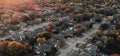 Panoramic top view residential subdivision with colorful leaves