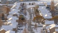 Panorama Aerial view of Utah Valley neighborhood with homes and roads on snowy winter day Royalty Free Stock Photo