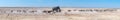 Panorama of african elephant drinking water at the Nebrownii waterhole Royalty Free Stock Photo