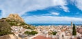 Panorama of Alicante old town and Santa Barbara Castle on Benacantil hill. Narrow streets, white houses in ancient