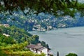 Panorama on the alpine hills above Lake Como, Pognana Lario, Lombardy, northern Italy. Royalty Free Stock Photo