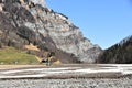 Panorama of Alps from the bottom of partly dried-up KlÃÂ¶ntalersee lake covered with snow and ice