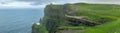 Panorama of amazing OBriens tower on Wild Cliffs of Moher, Burren region, County Clare, Ireland Royalty Free Stock Photo