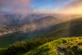 Panorama with amazing sunrise. Landscape with high mountains. Fog on the background. Touristic resort Carpathian national park, Royalty Free Stock Photo