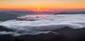 Panorama with amazing sunrise. Landscape with high mountains. Morning fog and dew. Touristic resort Carpathian national park, Royalty Free Stock Photo