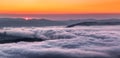 Panorama with amazing sunrise. Landscape with high mountains. Morning fog and dew. Touristic resort Carpathian national park, Royalty Free Stock Photo