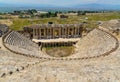 Ruins of the antique amphitheatre in Greco Roman city Hierapolis, Pamukkale, Turkey. Aerial panoramic view