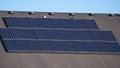 Panorama Array of solar panels on a house roof in close up Royalty Free Stock Photo