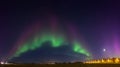 Panorama of aurora borealis at night in the city Royalty Free Stock Photo