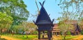 Panorama of Baan Dam Black House garden with Tripitaka Hall, on May 11 in Chiang Rai, Thailand