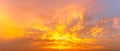 Panorama background of the sky covered with clouds and morning sun during the golden hour Royalty Free Stock Photo