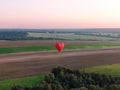 Panorama of balloon flight from altitude in summer in good weather over the field and houses