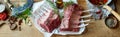 Panorama banner with two uncooked racks of lamb Royalty Free Stock Photo