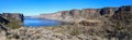 Panorama of the basalt cliffs towering above the Crooked River at Cove Palisades State Park in Oregon, USA Royalty Free Stock Photo