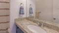 Panorama Bathroom interior with vanity sink and lighting fixtures Royalty Free Stock Photo