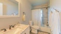 Panorama Bathroom interior with window and warm ambient lighting Royalty Free Stock Photo