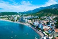 Panorama of the beach and the resort towns of Becici and Rafailovici, located at the foot of the mountains. Montenegro