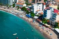 Panorama of the beach and the resort towns of Becici and Rafailovici, located at the foot of the mountains. Montenegro
