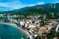 Panorama of the beach and the resort towns of Becici and Rafailovici, located at the foot of the mountains. Montenegro