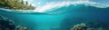 panorama of a beach resort and underwater world at the same time, dividing the image into upper and lower parts by a wave Royalty Free Stock Photo