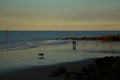 Sheringham beach at sunset. Royalty Free Stock Photo