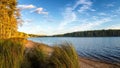 Panorama of beautiful autumn landscape with lake and forest on the Bank of Russia, the Urals Royalty Free Stock Photo