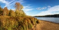 Panorama of beautiful autumn landscape with lake and forest on the Bank of Russia, the Urals Royalty Free Stock Photo