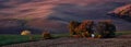 Panorama of beautiful colorful autumn landscape with white chapel St.Barbara in curved fields. Kyjov South Moravia.Czech republic. Royalty Free Stock Photo