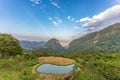 Panorama of the beautiful countryside of Northern Thailand. Sunny afternoon. Wonderful spring landscape in mountains, meadows, Royalty Free Stock Photo